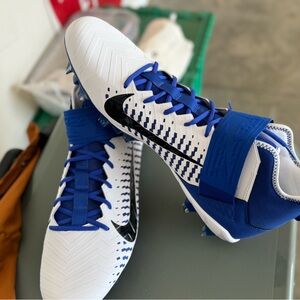 Brand new Nike  football cleats with box colors royal blue, white, black